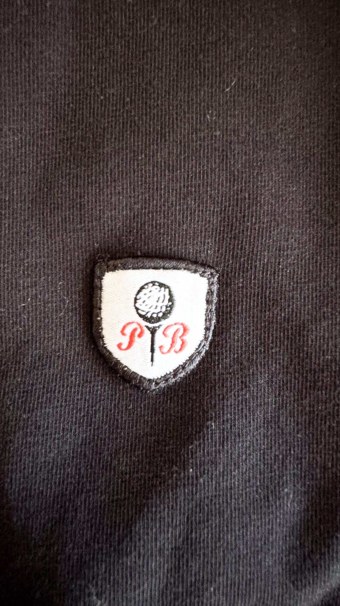 Polo noir Poivre Blanc femme manches courtes taille XS
