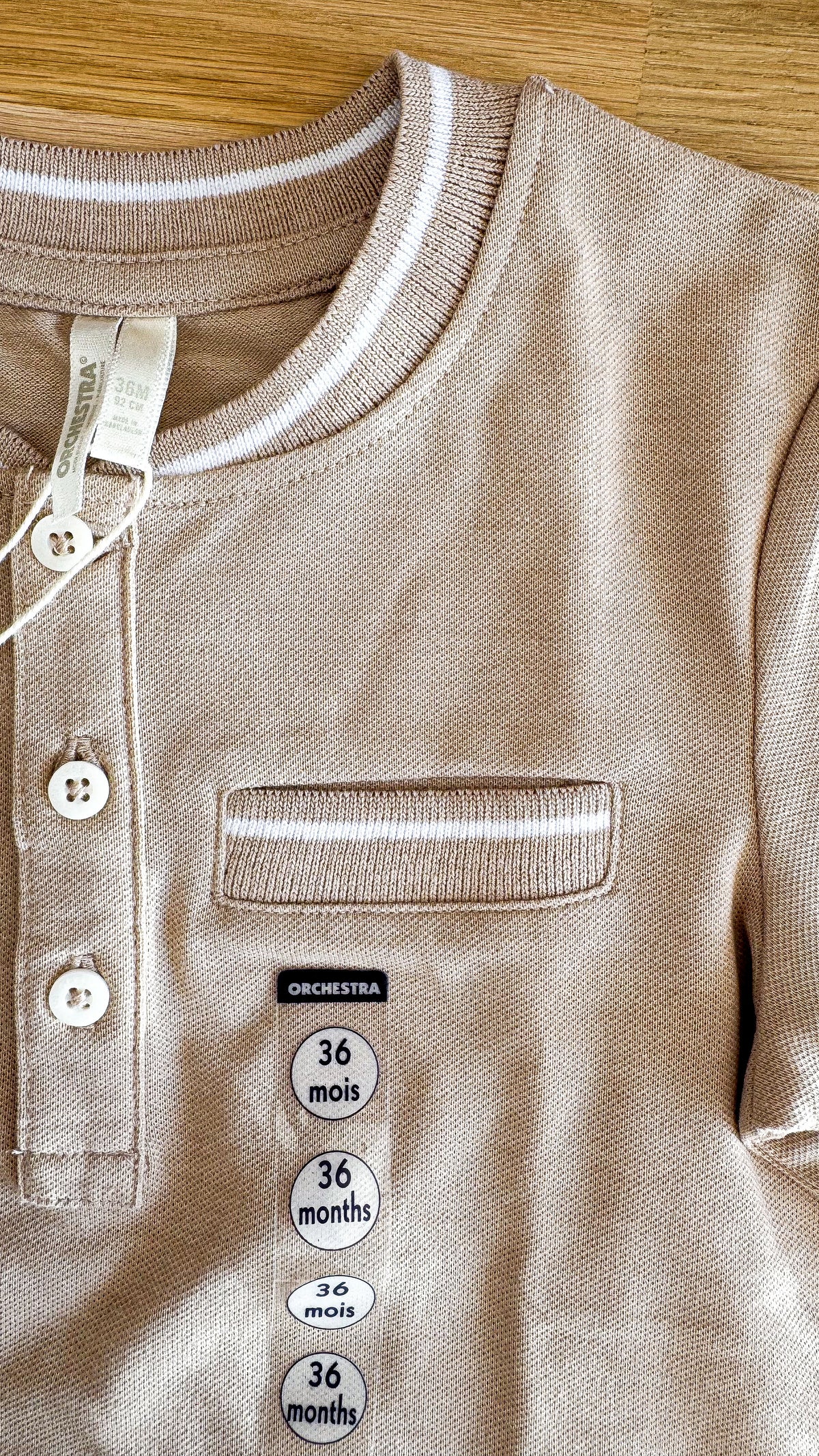 Polo beige neuf étiquette poche 36 mois - Orchestra