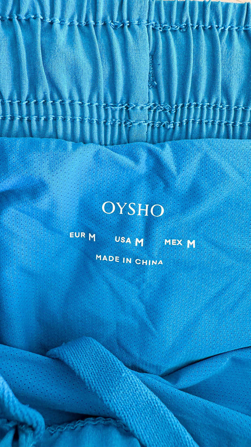 Short sport turquoise liseré blanc M - Oysho