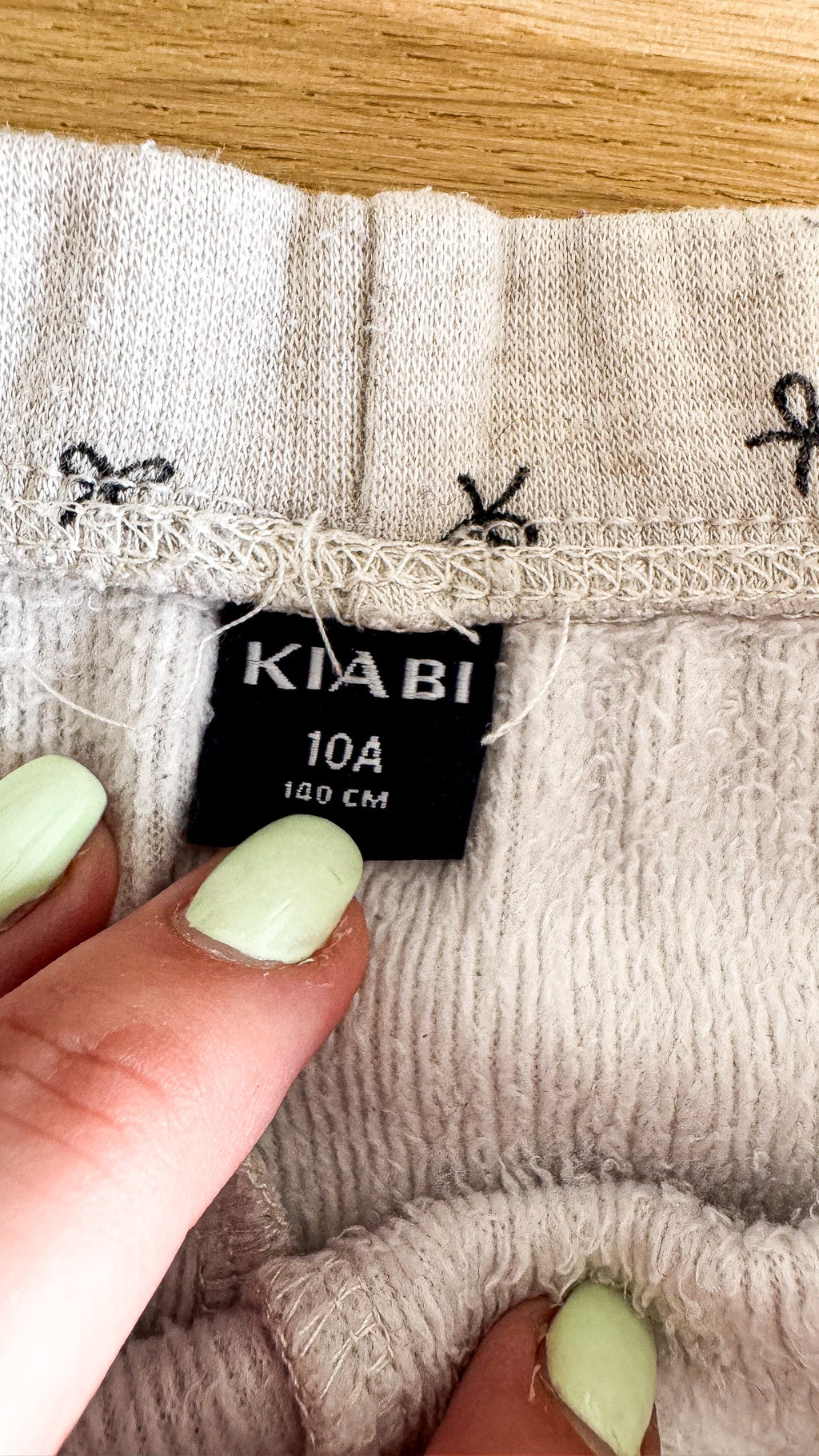 Bas de pyjama gris chiné imprimé nœuds 10 ans - Kiabi