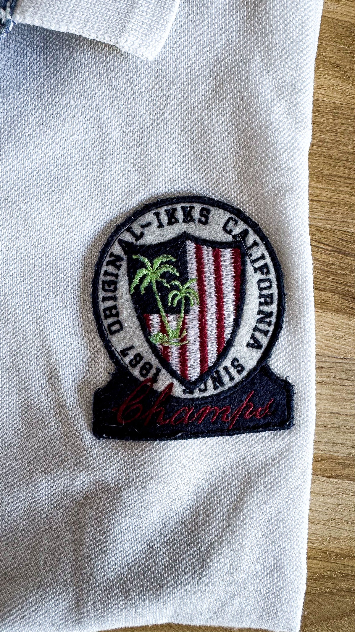 Polo blanc écusson palmiers "1987" 8 ans - IKKS