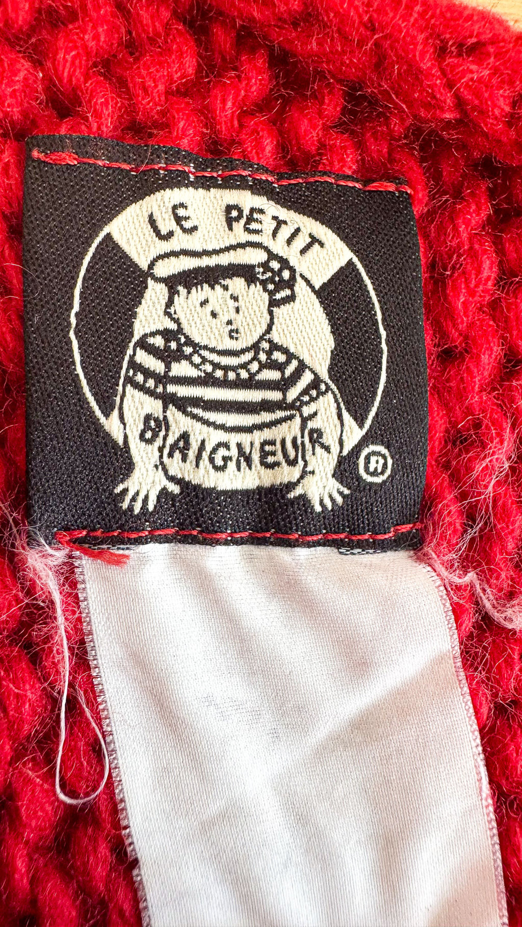 Cape poncho tricot Le Petit Baigneur rouge taille unique
